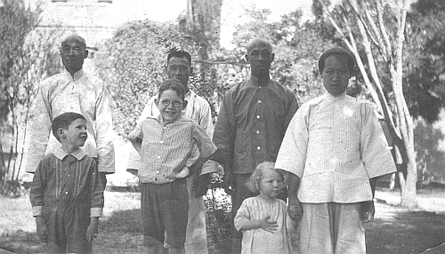 Jim, Harold, and Elizabeth with her amah, Tien Da Tsao