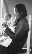 Harold Stambaugh Robinson at 2 weeks old with the nurse who took care of him and his mother while still in the hospital