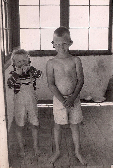 PAR and BAR wearing cherries on south front porch of Cozy Cottage, circa 1955