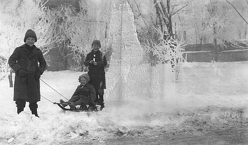 Robinson house in Paotingfu--Hal, Elizabeth, and Jim in the snow