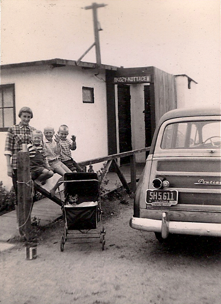 Ann Berson with PAR, SRR, and BAR outside Kozy Kottage, circa 1955