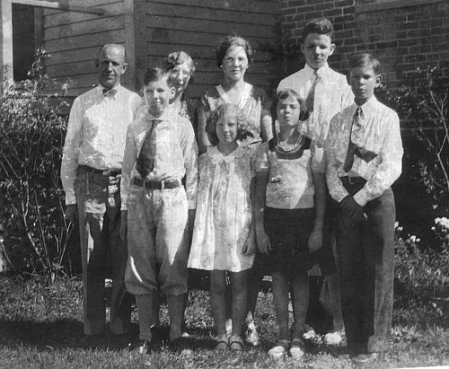 Family picture; l-to-r: Harold, James, Mary, Elizabeth, Aunt Bess, Betty Jeanne, Harold, and Sidney, circa 1932